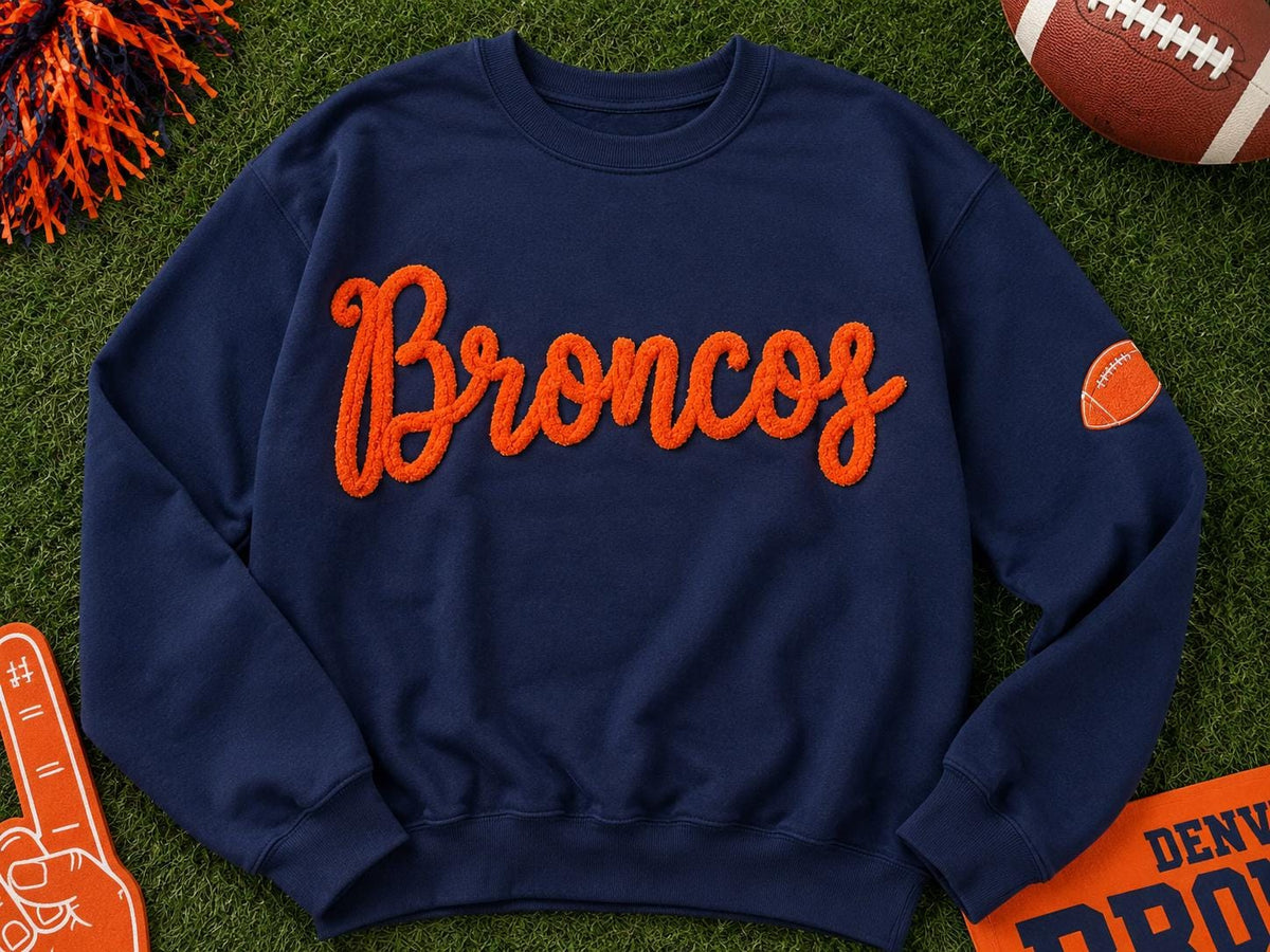 Navy sweatshirt with custom orange chenille script team name